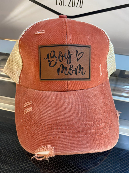 Burnt orange pony tail hat